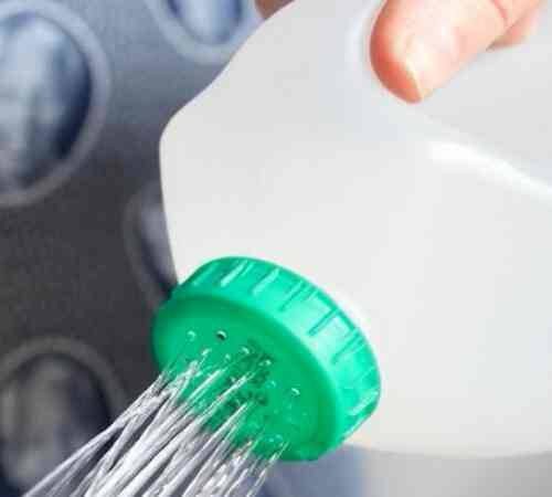 turning-used-jerry-cans-into-plant-watering-tools